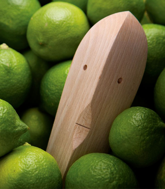 Wooden lemon squeezer